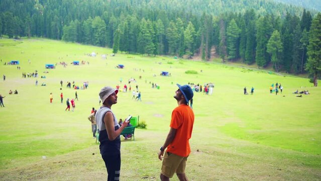 People walking in the park, Jammu and Kashmir, India.