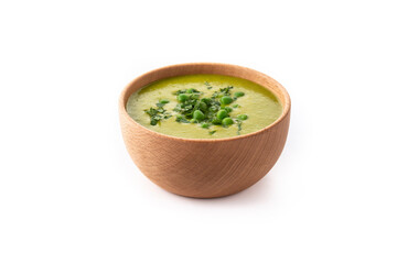 Green pea soup in a bowl isolated on white background