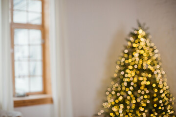 Blurred Christmas tree with bokeh lights