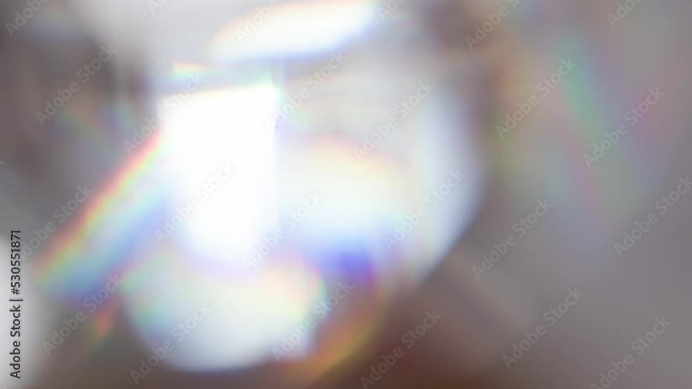 Wall mural rainbow flicker and sunny bokeh. loop. the light passes through the facets of a slowly rotating diam