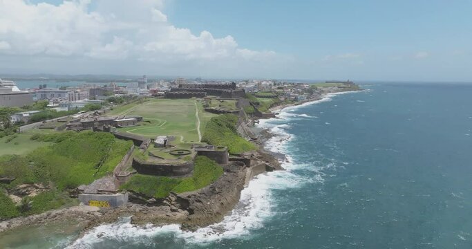 San Juan, Puerto Rico drone shot on a Sunny day with clear blue sky. El Morro and el castillo san felipe can be seen on the shot 3