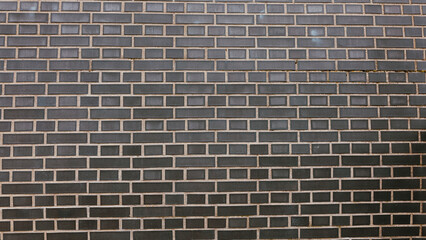 Dark clinker brick wall background