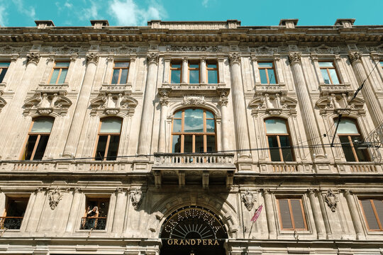 Grand Pera building in Istiklal Street, historical structure in Istanbul, travel and explore idea, aesthetic structure, architectural footage in Turkey, :Beyoglu, Istanbul, Turkey - July 15 2022
