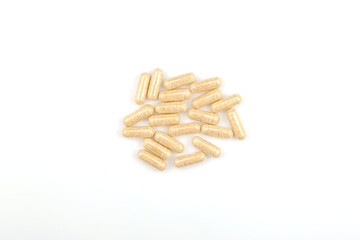 Heap Hulbah pills on white background. Herbal nutritional supplements. Hulbah pills help reduce discomfort and menstrual cramps associated with PMS ease menopausal symptoms
