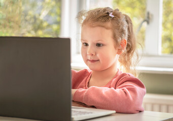 kid child studying typing on computer laptop 