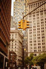 yellow traffic lights and skyscrapers in New York city in USA