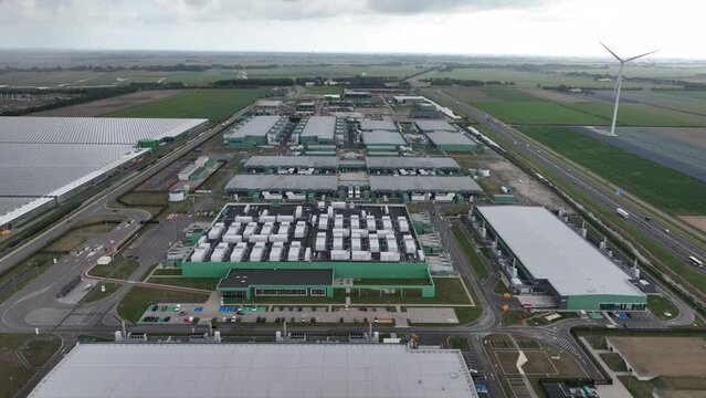 Datacenter building complex computing center in Hollands Kroon. Data technology ICT equipment building housing like servers. Building facility communication tech.