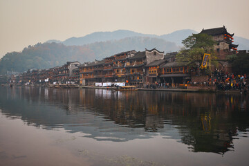 Naklejka na ściany i meble Ancient Town of Fenghuang is one of the most historical and cultural cities. One of the Ten Cultural Heritage Sites in Hunan, China.