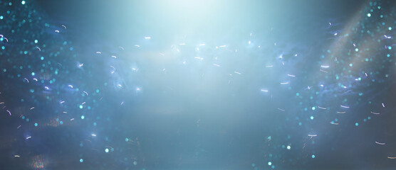 Fototapeta background of abstract glitter lights. silver, blue and black. de focused obraz