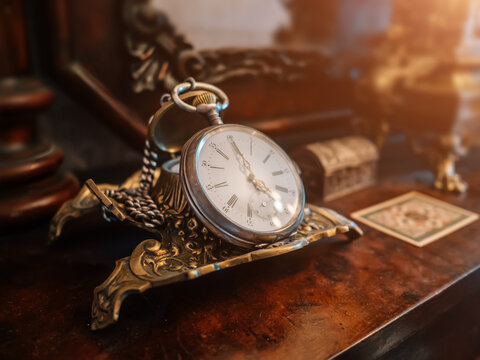 Ancient vintage antique pocket watch or clock close up.