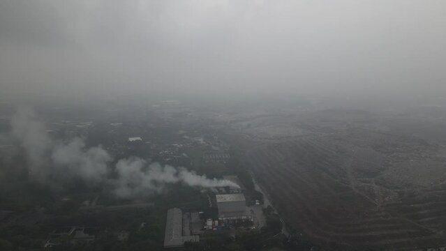 industry fog from landfill mining rubbish