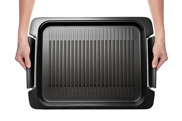 Close up of hands holding a large grill tray, ready to serve. Isolated on white with clipping path. Top view.