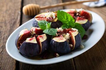 Fresh figs with cream cheese honey and nuts