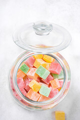Turkish Delight. view of the tol with a cup of tea and Turkish delight sweets on a plate. A traditional oriental treat is sweetness.