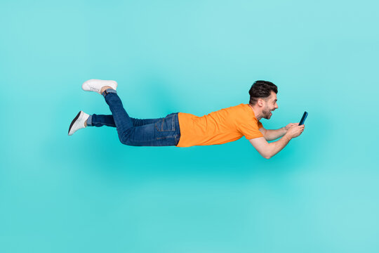 Profile side photo of blogger guy use gadget search network use connection isolated on cyan color background