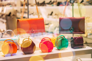 Fashion Accessories In Shop Window Showcase Of Store Mall Market Shelf With Fashion Bags In Store....