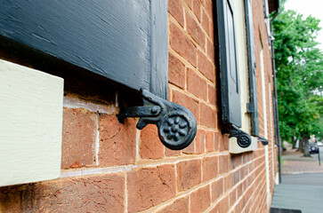 A vintage iron window shutter latch
