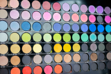Vibrant professional eyeshadow for make up - close up view. Makeup, beauty, fashion and glamour concept