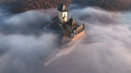 Morning mist at Karlstejn Castle