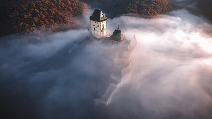 Gothic Castle Karlstejn in the fog