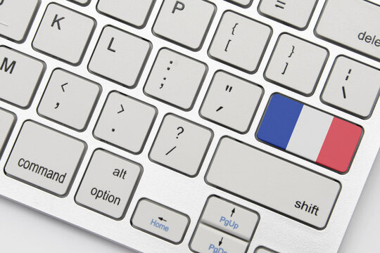 national flag of france on the keyboard on a grey background .3d illustration