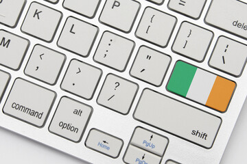 national flag of ireland on the keyboard on a grey background .3d illustration