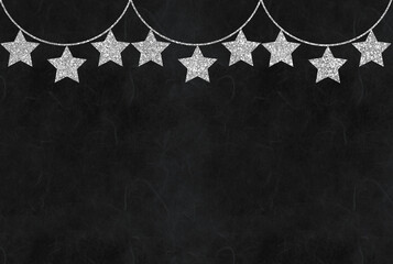 black  background with silver stars