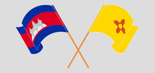 Crossed and waving flags of Cambodia and the State of New Mexico