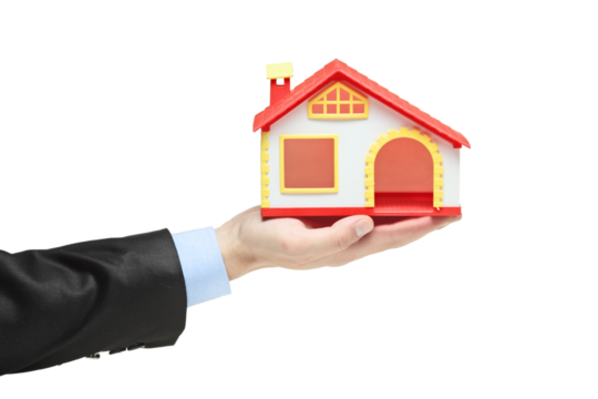 Hand of a businessman holding a house - Powered by Adobe