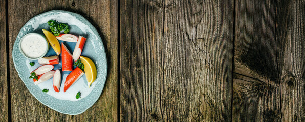 Fresh Sliced Crab Stick Slices Surimi, Long banner format. top view © Надія Коваль