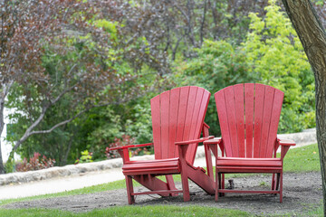 Two Red chairs in a public park