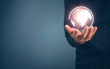 Globe, Earth in the human holding our planet glowing, Concept take care of the world.