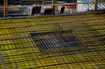 formwork in front of the concrete ceiling. the wires are like a net that stays inside the structure of the columns and the reinforcement strengthens the building even against an earthquake.