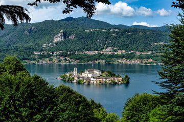 Orta lake with San Giulio island seen from the famous and picturesque town of Orta San Giulio, Italy