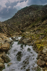 Naklejka na ściany i meble Streams and rocks in the plateau mountains of Tibet Autonomous Region.