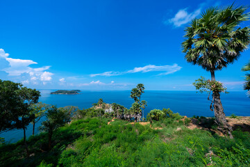 Fototapeta na wymiar Promthep Cape is one of the most photographed locations in Phuket. Phromthep cape viewpoint at blue sea sky in Phuket, Thailand.