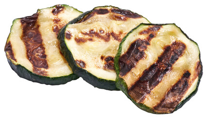 Slices of zucchini roasted on a grill with stripes from a grill isolated