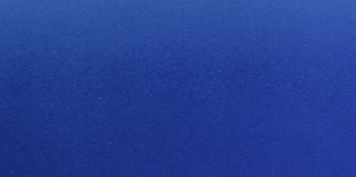 Stylish metallic texture in bright blue tones. Platinum paper with blue nuances. Textured background with sparkles and a gradient of light blue tones. Detail. Cosmic. Glitter. Shiny. Luxury. Elegant.