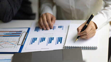 Business Marketing Strategy Analysis and Investment Planning. Business adviser meeting to discuss the situation on the financial report. Financial advisor and accounting concept.