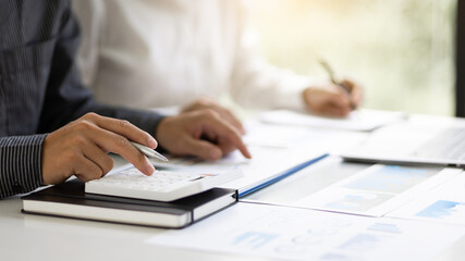 Business Marketing Strategy Analysis and Investment Planning. Business adviser meeting to discuss the situation on the financial report. Financial advisor and accounting concept.