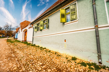 Viscri, Romania: Blue old painted traditional house from Viscri village, Transylvania, German Saxon...