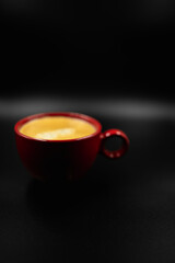 cup of coffee on a black background