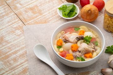 Macaroni Soup with drumette chicken ,tomato ,carrots and onion ,easy asian style clear soup in...