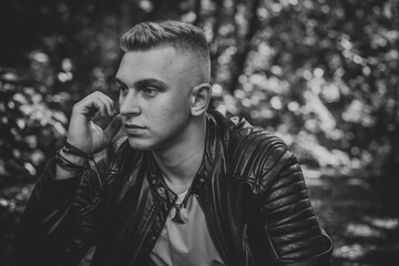 Young blonde Nordic appearance guy, style for youth accessorize for men, casual street style