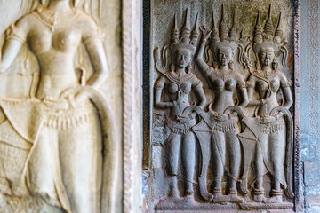 Cambodia. Siem Reap Province. A Devata sculpture at Angkor Wat (Temple City). A Buddhist and temple complex in Cambodia and the largest religious monument in the world