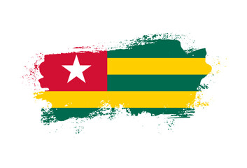 Flag of Togo country with hand drawn brush stroke vector illustration