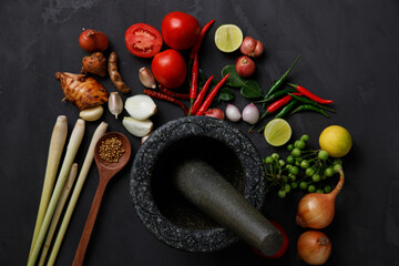 Thai kitchen. Various herbs, spices and Ingredients on dark background. Top view