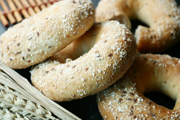 many bagel bread on wooden table 