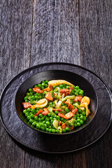 petits pois, french dish of garden green peas