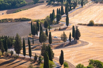 Winding road in Tuscany, Italy in summer. Famous landmark countryside and tourism destination